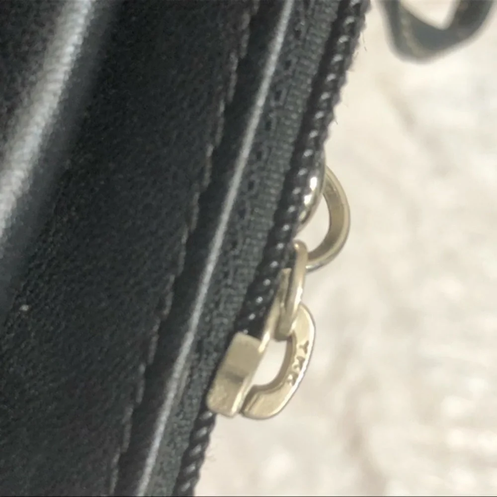 Coach vintage black leather turnlock wristlet bag